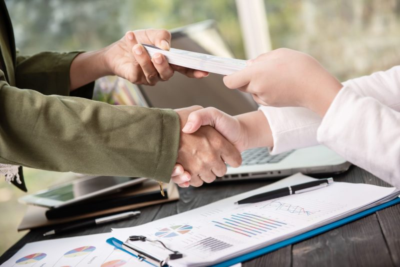 Business People Shaking Hands Finishing Up Meeting (1)